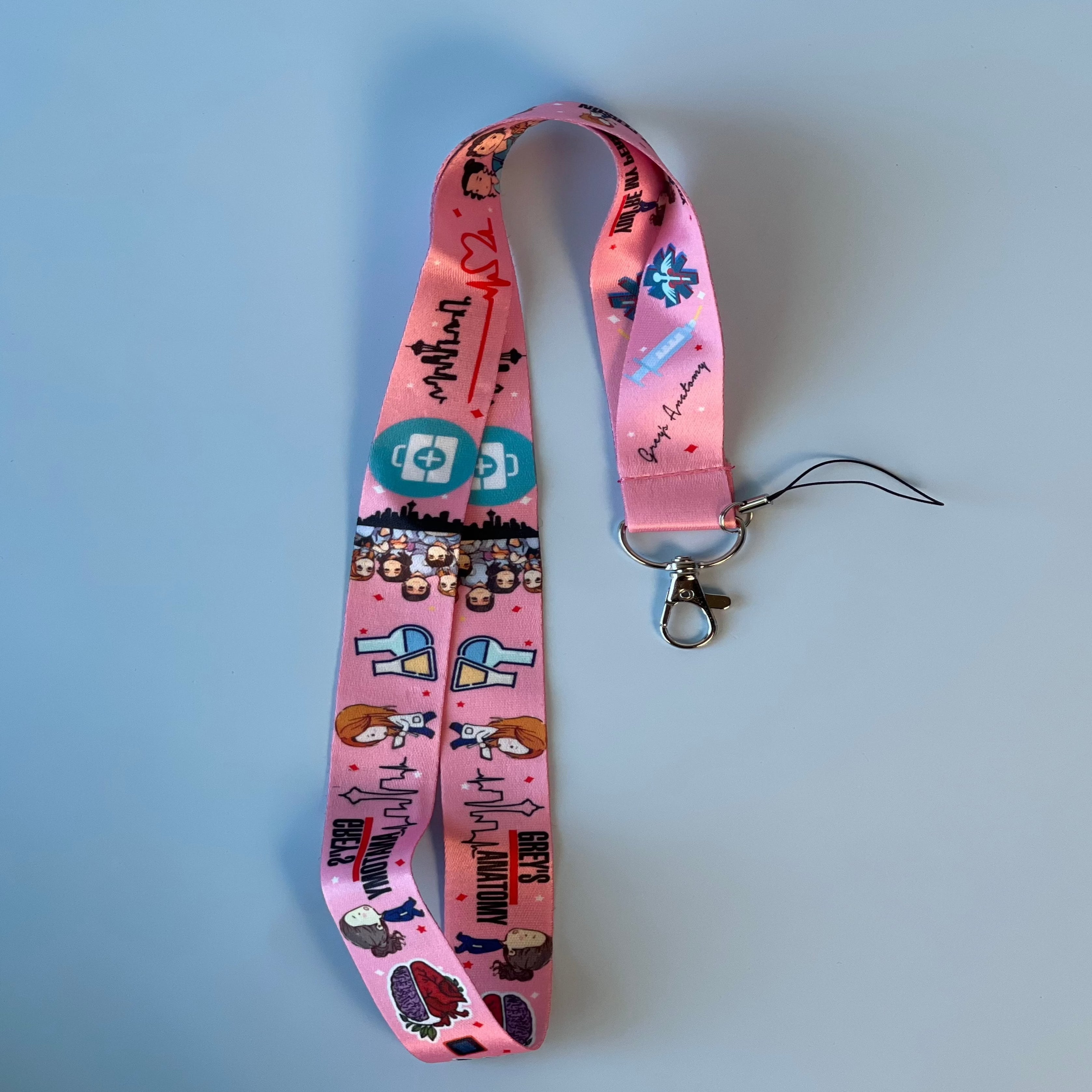 سلسال حامل بطاقة وردي من قريز أناتومي برسومات طبيه كوميكس