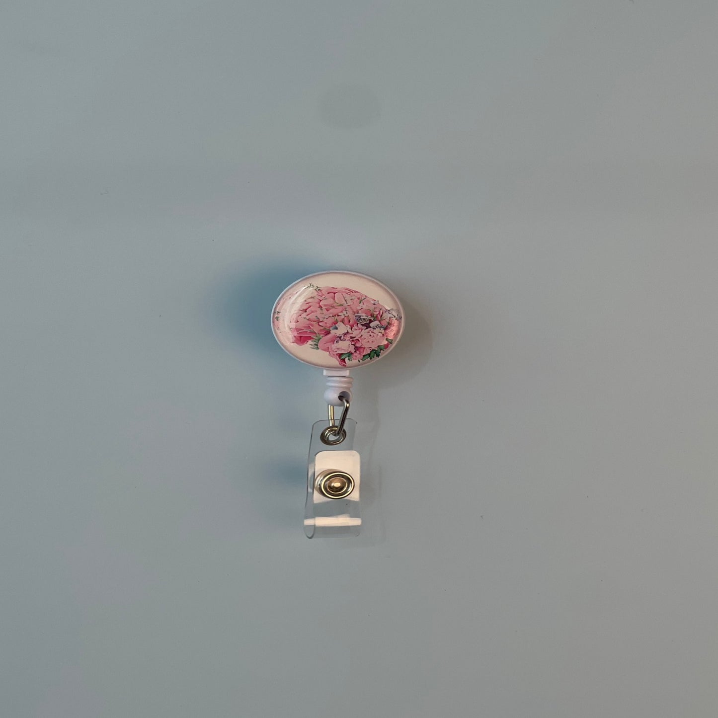 مثبت شارة على شكل أزهار