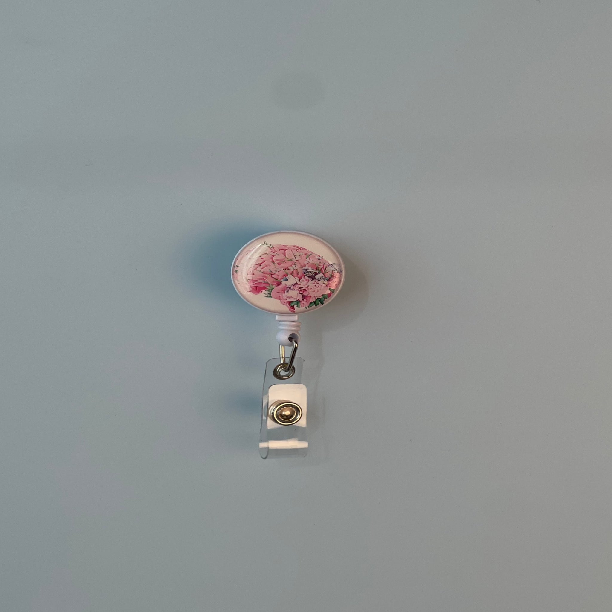 مثبت شارة على شكل أزهار